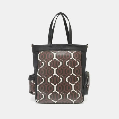 Brown and white hexagon patterned Nicole Lee tote bag with vegan leather and zip compartments