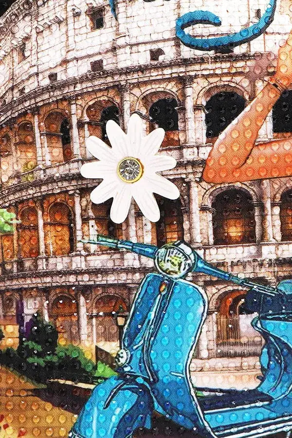 Textured artwork with Colosseum, blue Vespa, and white daisy on Martha Travels Italy handbag