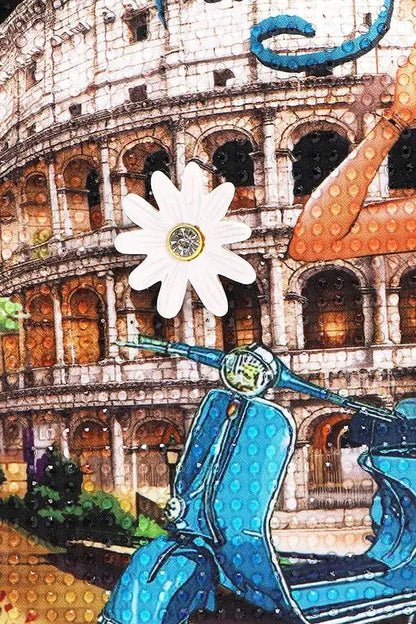 Textured artwork with Colosseum, blue Vespa, and white daisy on Martha Travels Italy handbag