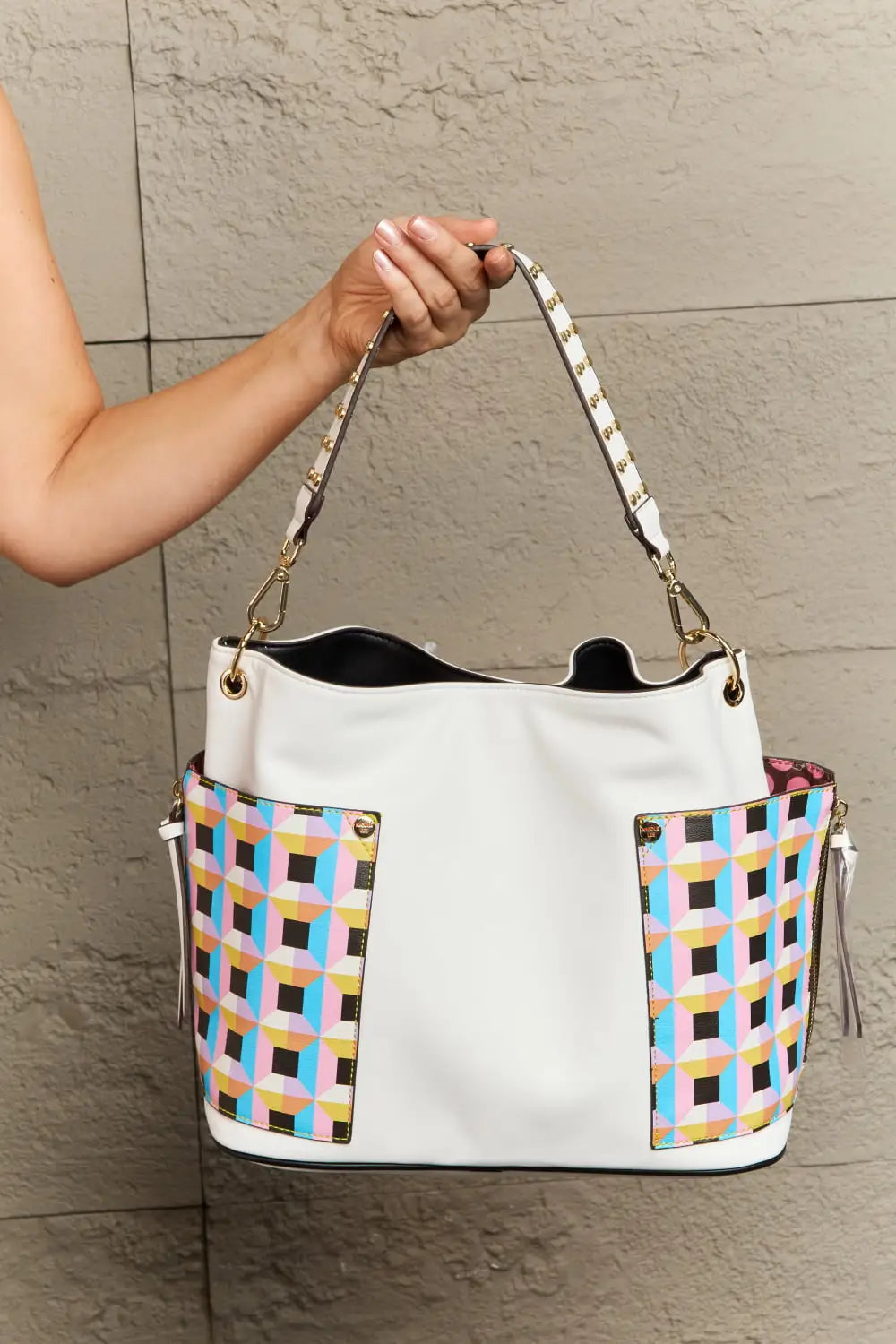 White bucket bag with multicolored woven panel and silver hardware from Nicole Lee USA large shoulder set
