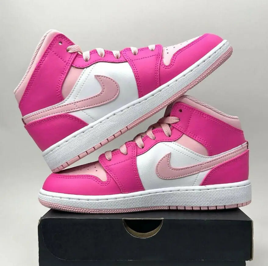Pink and white Nike Air Jordan 1 Mid sneakers with fast shipping available in business days