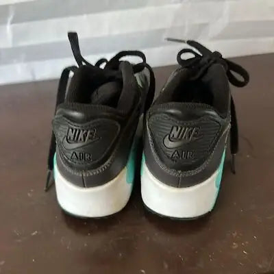 Black youth Nike Air Max 833414-033 running sneakers with teal accents and white soles