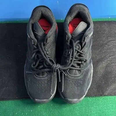 Nike Air Max black low top sneakers with red insoles for athletic comfort