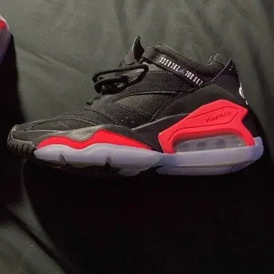 Nike Air Max black low top sneaker with red and translucent accents for athletic style