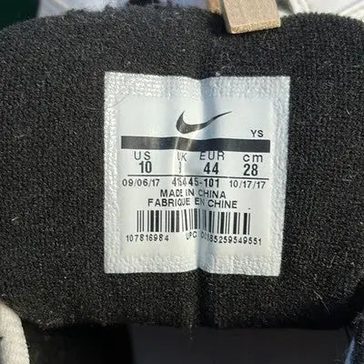 Nike Air Max Sneakers size tag with manufacturing details for men’s running shoes