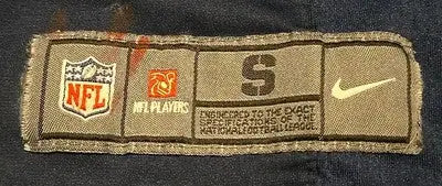 Nike Ezekiel Elliott Cowboys Jersey tag showcasing player name and size detail