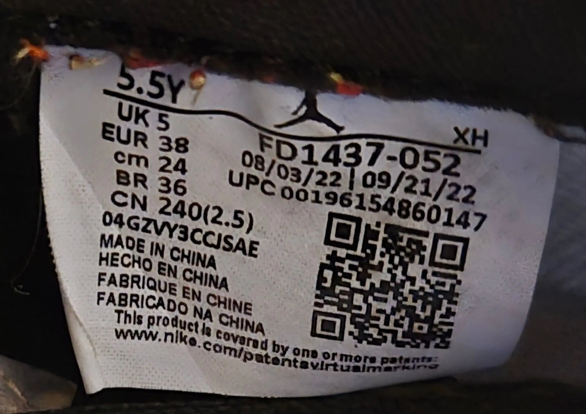 Sneaker size tag with manufacturing details and QR code for Nike Jordan Air Leather Shoes with elephant print