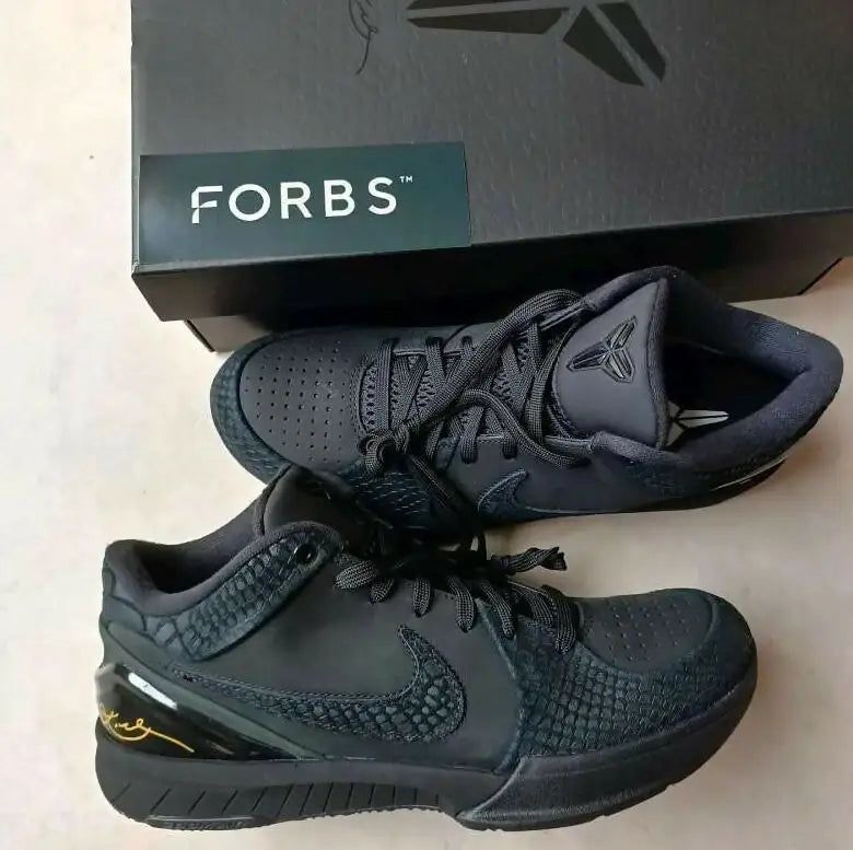 Black Nike Kobe basketball shoes with reptilian texture in Forbes box, fast shipping available