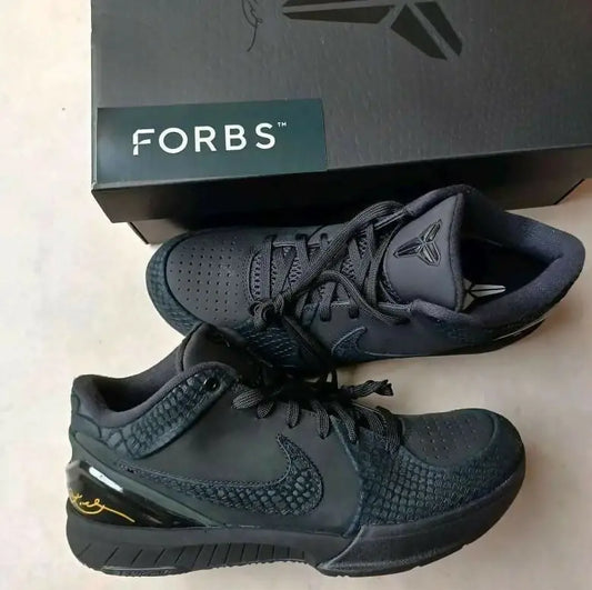 Black Nike Kobe basketball shoes with reptilian texture in Forbes box, fast shipping available