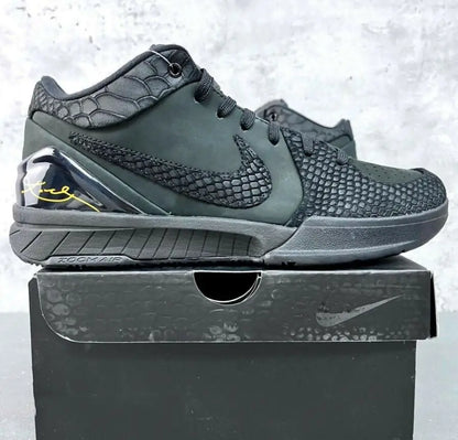 Black Nike Kobe 4 Protro basketball shoe with snakeskin texture and yellow signature detail, fast shipping available