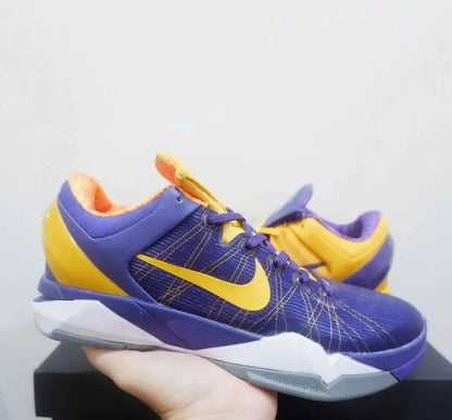 Purple and yellow Nike Kobe 7 Yin Yang basketball shoes with white and gray soles for fast shipping