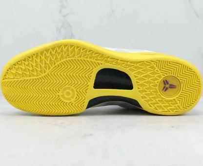 Vibrant yellow sole of Nike Kobe 8 Protro Lakers Home basketball shoe with traction patterns, fast shipping