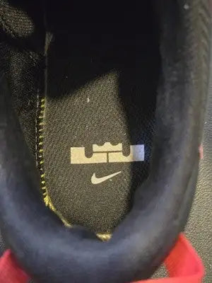Insole of Nike LeBron Witness 4 with LeBron James crown logo and mesh upper