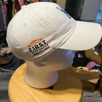 White Nike Memphis University Hat with blue embroidered logo and SERVPRO First Responder Bowl text