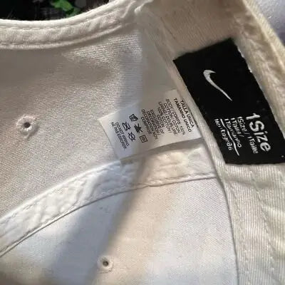 White fabric Nike Memphis University Hat with internal tags for comfort and authenticity