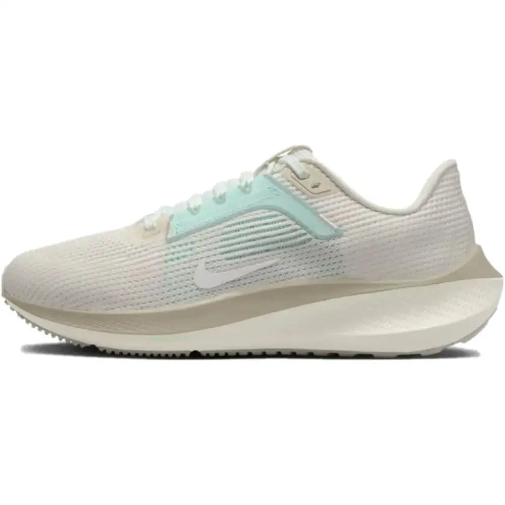 Light-colored Nike Pegasus road running shoes with mint green accent in Phantom Jade Ice size 8.5