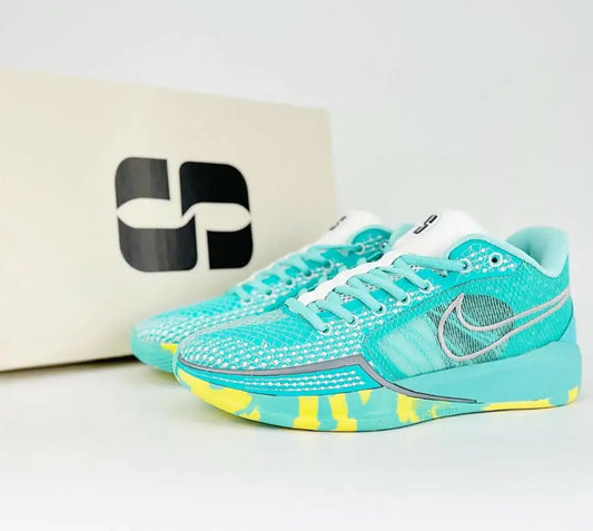 Teal and yellow Nike Sabrina 1 Lonescu Ice Blue athletic shoes with fast shipping options