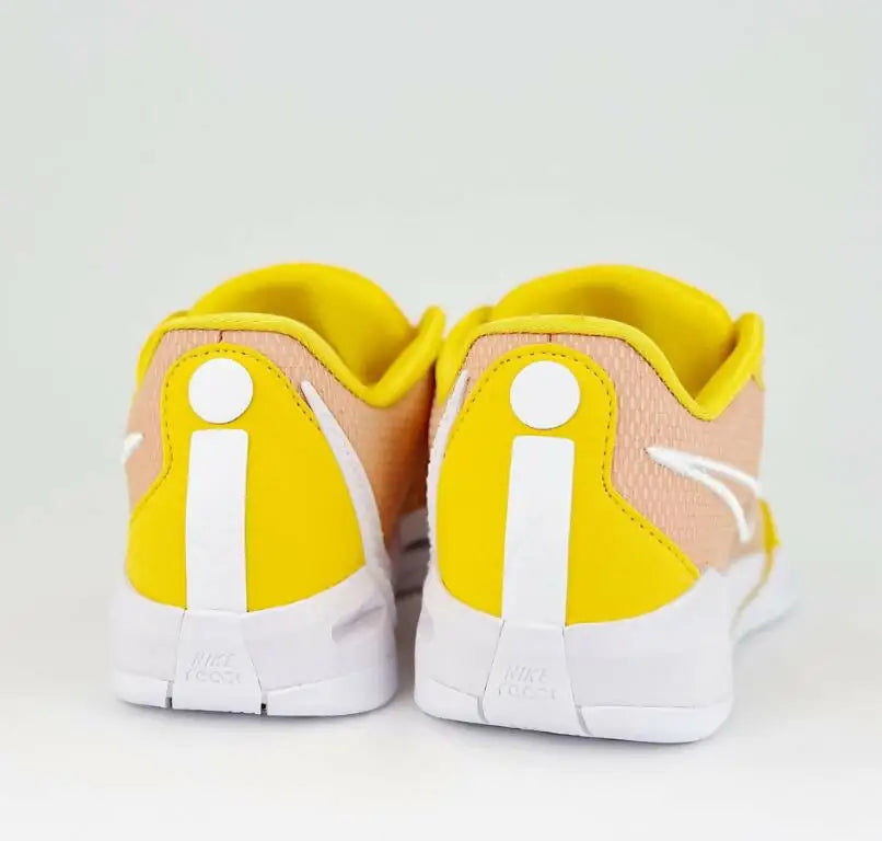 Nike Sabrina 1 Tb University Gold athletic shoes with yellow, peach, and white design