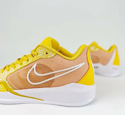 Nike Sabrina 1 Tb University Gold athletic shoes in yellow and peach with white soles, fast shipping