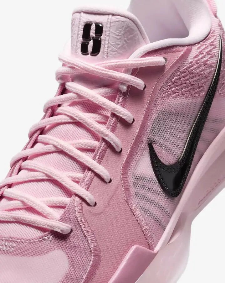 Pink athletic shoe with black Nike Swoosh and matching laces from Nike Sabrina 2 bubble Elemental Pink, available with fast shipping in 1-3 business days