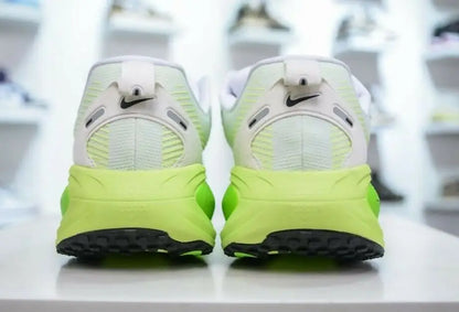 Nike Vomero 18 electric Green Volt running shoes with white, neon green, and black soles