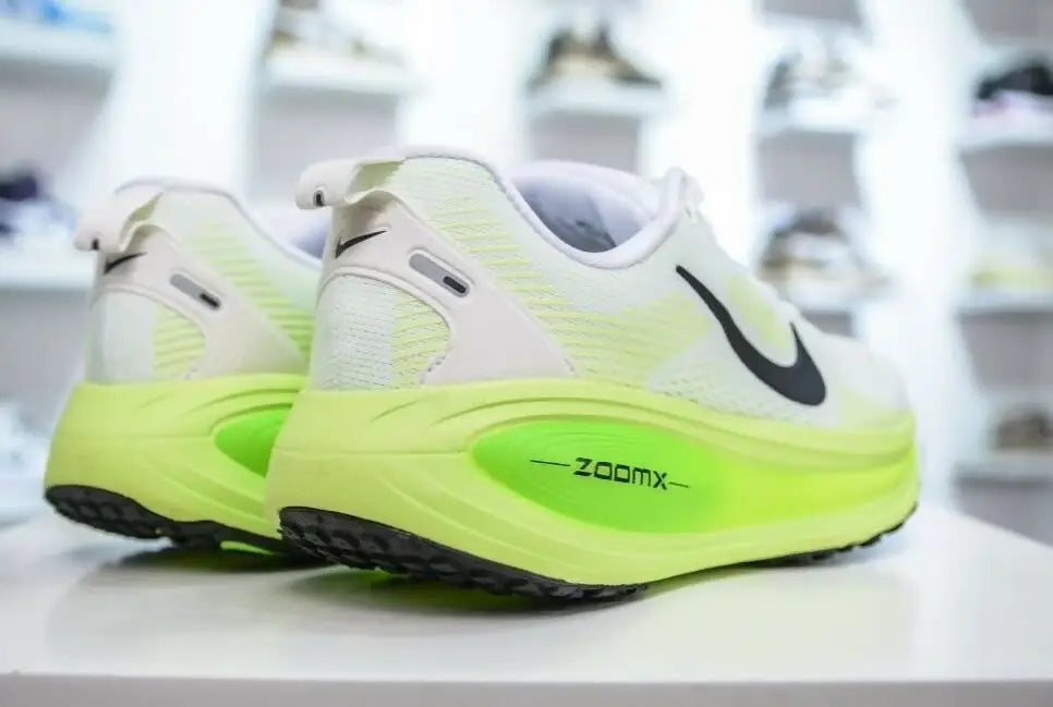Nike Vomero 18 electric Green Volt running shoes with white neon yellow design and black soles for fast shipping