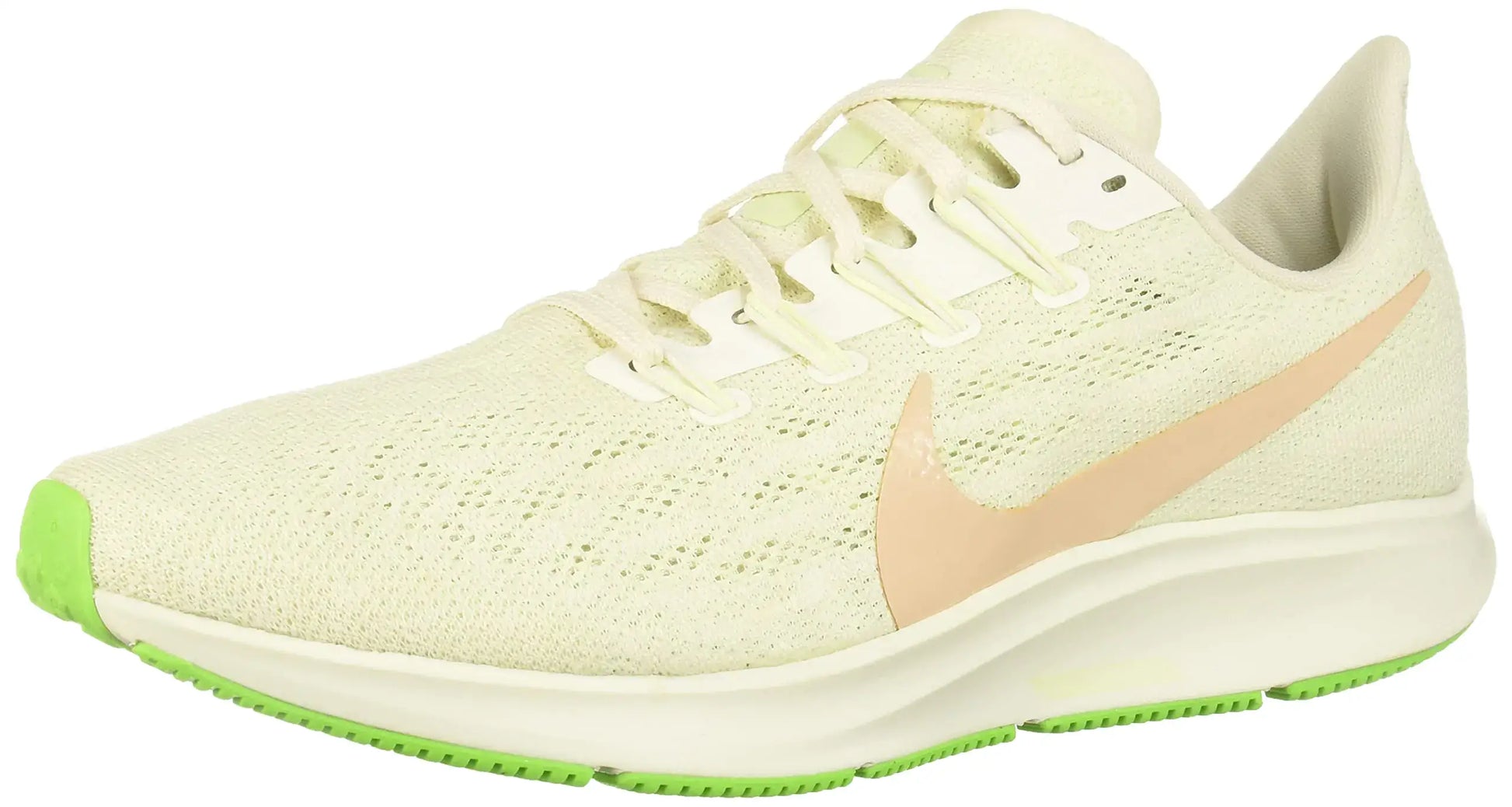 Beige Nike womens track and field running shoe with multicolor accents