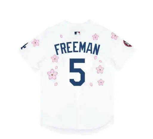 White Nike baseball jersey with cherry blossom design from Takashi Murakami MLB Tokyo Series