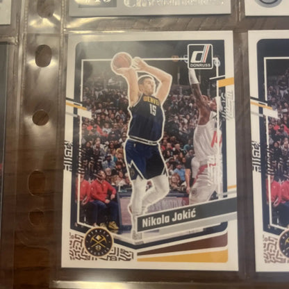 Nikola Jokić basketball card from a trading card lot featuring 16 cards