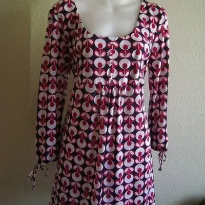 Boundaries Juniors floral dress with long sleeves, scoop neck, and cinched waist