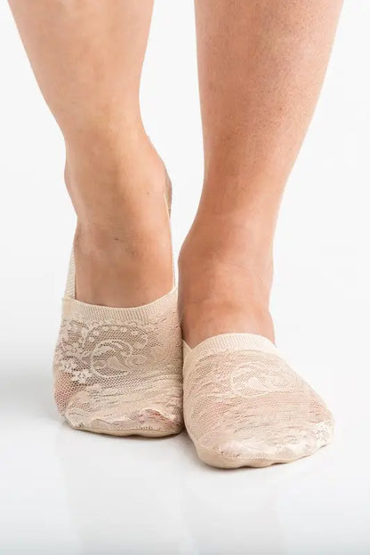 Nude-colored floral lace sneaker socks on feet from the No-Slip Floral Lace Sneaker Socks 3 Pack