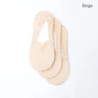 Three pairs of beige floral lace sneaker socks in the No-Slip Floral Lace Sneaker Socks 3 Pack