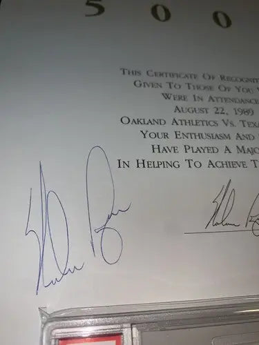 Autographed certificate of recognition featuring Nolan Ryan and Rickey Henderson ticket stub