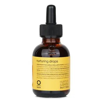Brown glass dropper bottle with black cap containing Nurturing Drops Hair Serum