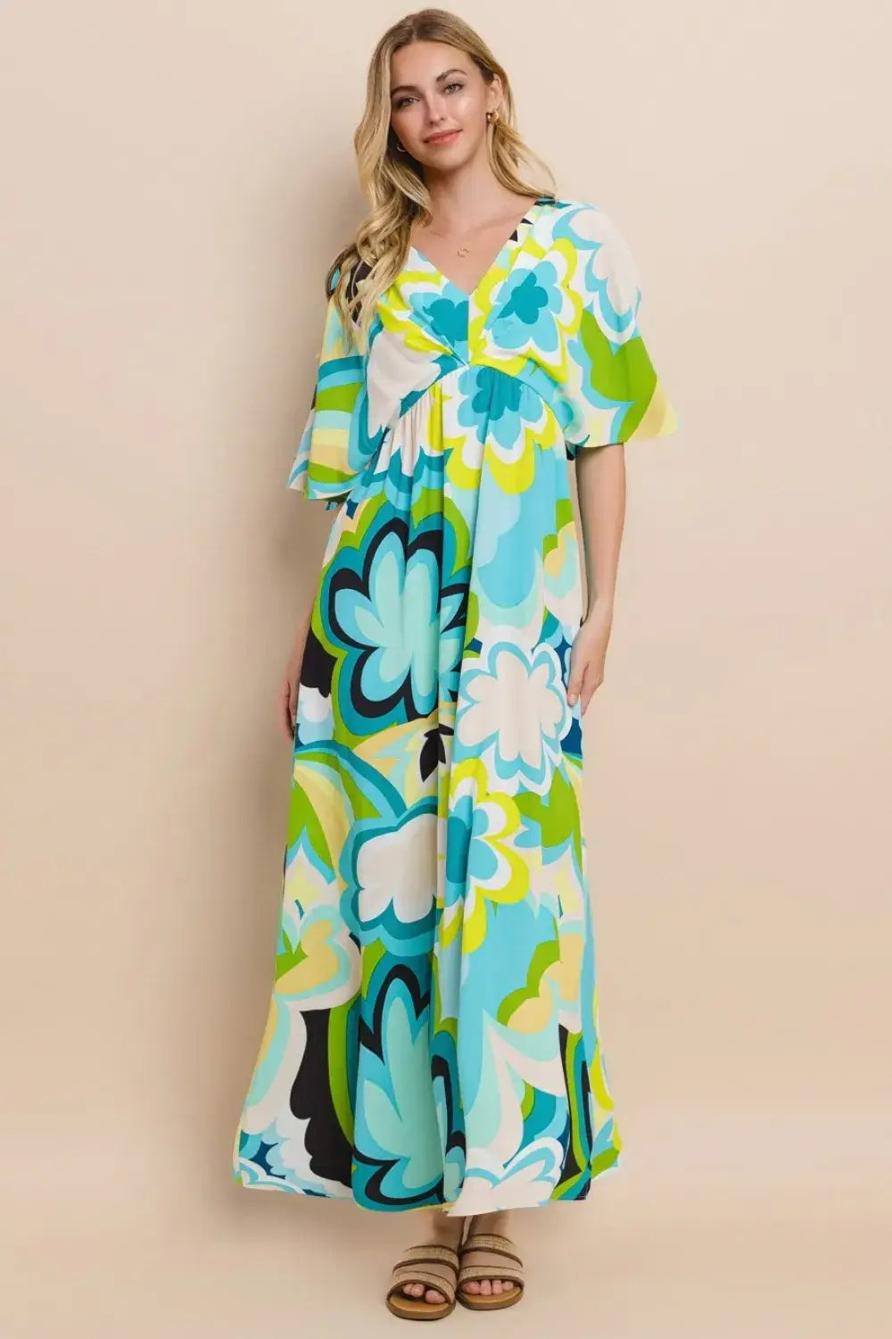 Floral printed slit maxi dress in vibrant turquoise green and white with tie waist