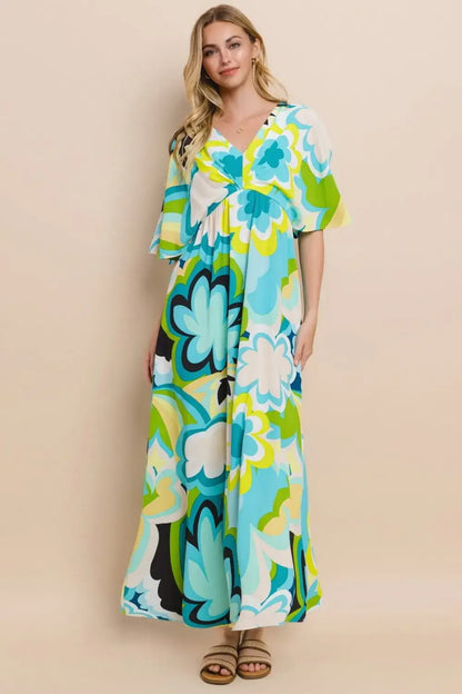 Floral printed slit maxi dress in vibrant turquoise green and white with tie waist