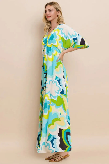 ODDI floral printed slit maxi dress with green, blue, and white floral pattern