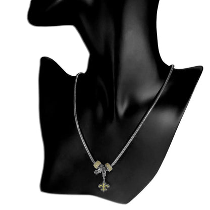Bead necklace featuring a fleur-de-lis pendant on a thin chain for NFL team fans