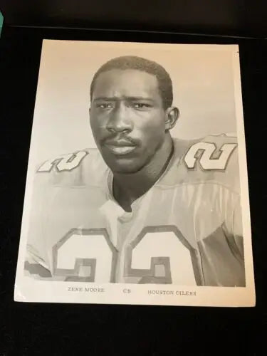 Black and white portrait of Zeke Moore, Houston Oilers player for trading cards