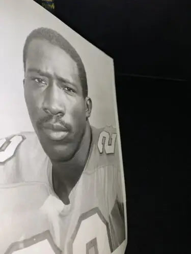 Monochrome portrait of Zeke Moore, Houston Oilers player, for trading cards collection