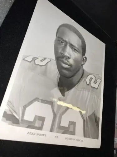 Black and white photo of Zeke Moore for Houston Oilers trading cards collection