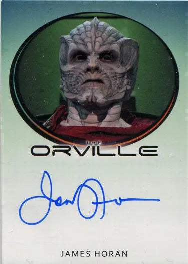 Alien character in red uniform, textured gray skin; James Horan Autograph Card