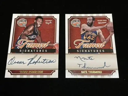 Two autographed basketball cards of Oscar Robertson and Nate Thurmond from Panini Famed Signatures
