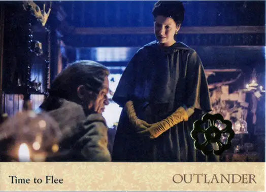 Two people in period costume in a dimly lit setting from Outlander Season 2 Gold Jacobite Seal