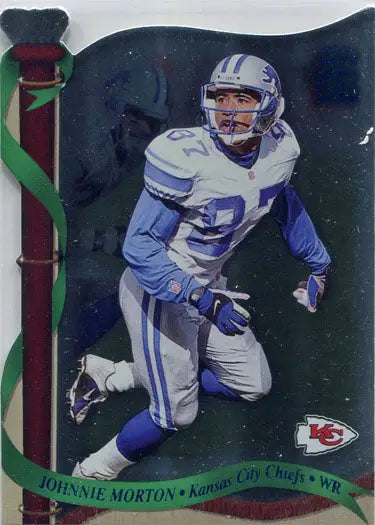 Football player in blue and white uniform 21 on field for Crown Royale trading cards