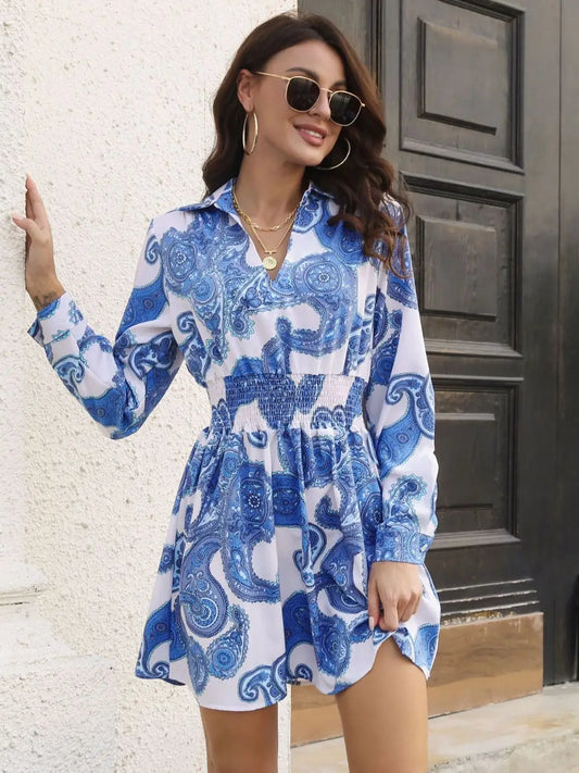 Women’s paisley print Johnny collar smocked dress with long sleeves and elastic waist