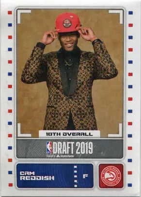 Basketball player in leopard print suit adjusting red cap on Panini sticker card