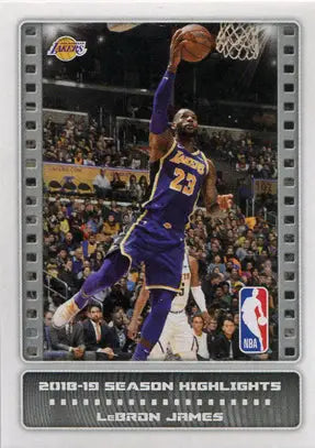 LeBron James soaring to dunk in a Lakers jersey on Panini Direct sticker card