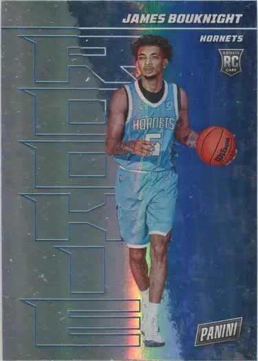 Basketball trading card of James Bouknight dribbling in Hornets uniform, rainbow parallel