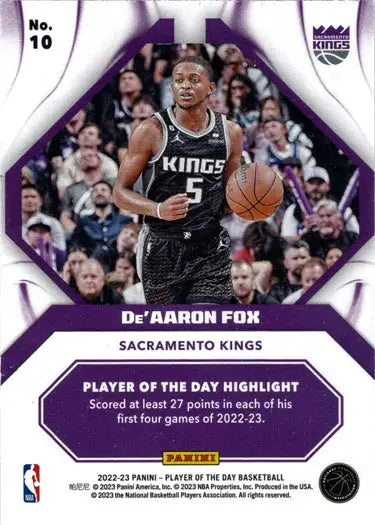 Basketball trading card of De’Aaron Fox in action, featuring purple foil parallel design